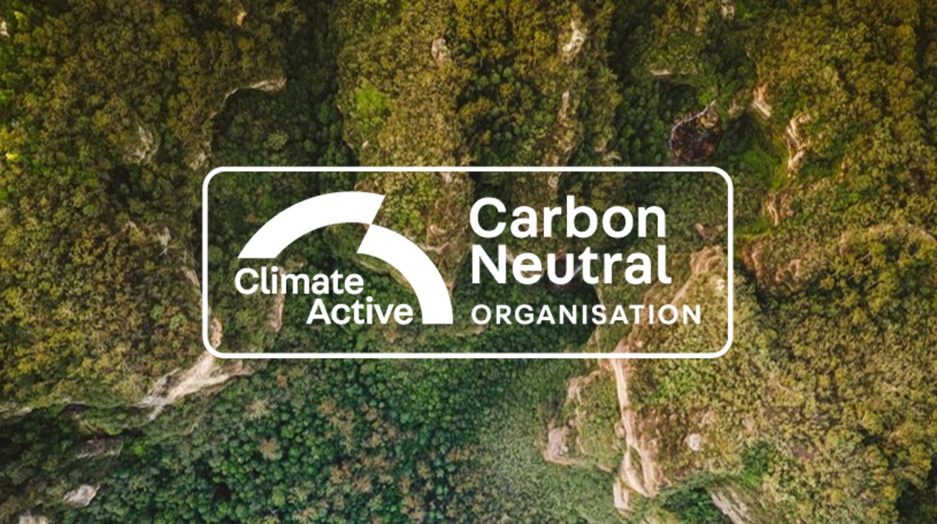 Climate Active - Carbon Neutral Certification Logo with nature background